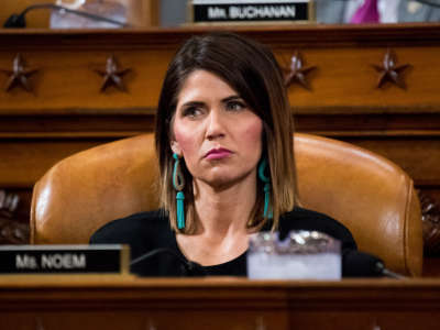 Then-Rep. Kristi Noem listens during a House Ways and Means Committee hearing, May 24, 2017. The South Dakota governor has refused to issue a statewide stay-at-home order.