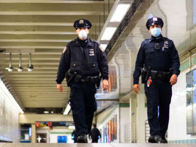 NYPD officers patrol inside Times Square station on May 6, 2020, in New York City.