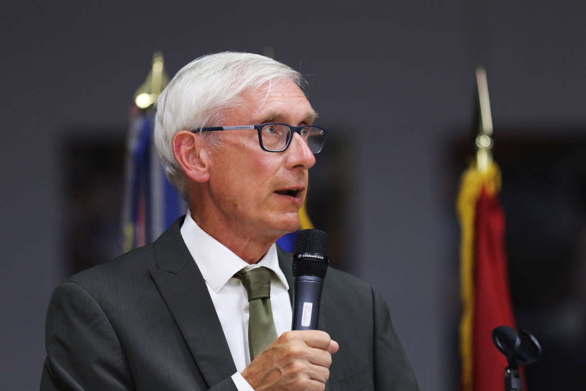 Gov. Tony Evers addresses the Wisconsin Army National Guard’s 1st Battalion, 128th Infantry Regiment, during a sendoff ceremony on July 14, 2019.