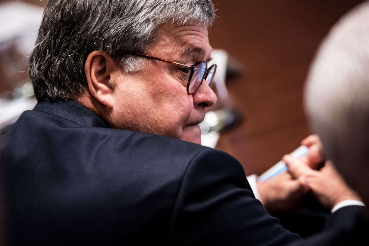 Attorney General William Barr listens during a cabinet meeting in the Cabinet Room at the White House on July 16, 2019, in Washington, D.C.