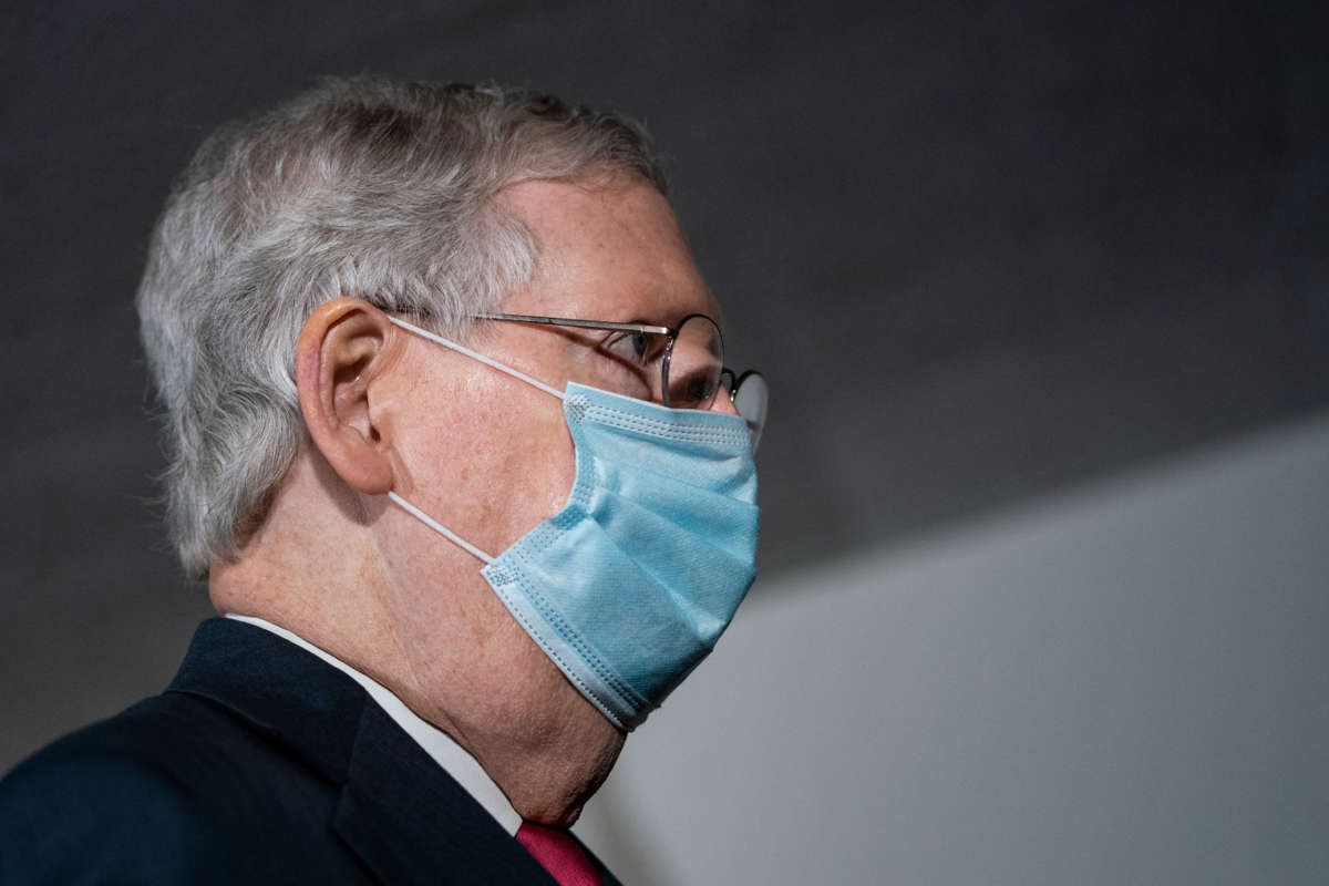 Mitch McConnell wears a face mask