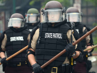 Police hold a line on the fourth day of protests on May 29, 2020, in Minneapolis, Minnesota.