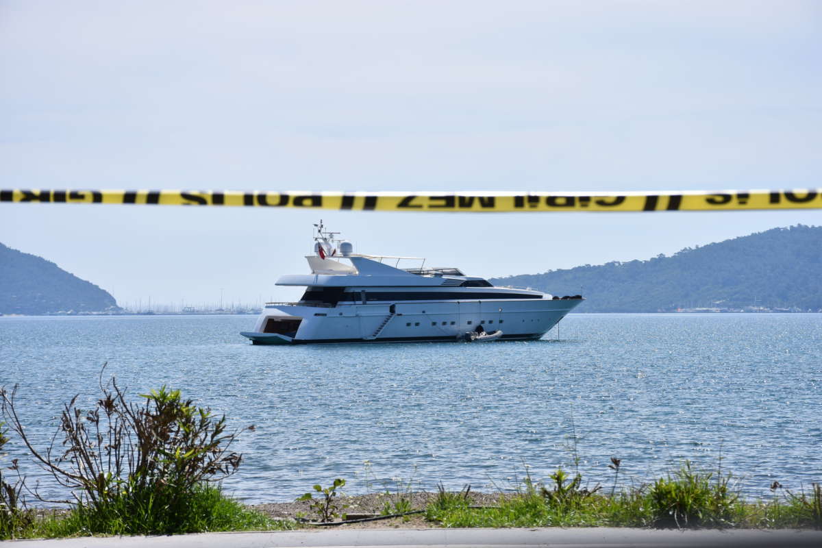 A yacht is seen behind a police tape in the Marmaris district of Mugla, Turkey, on April 18, 2020.