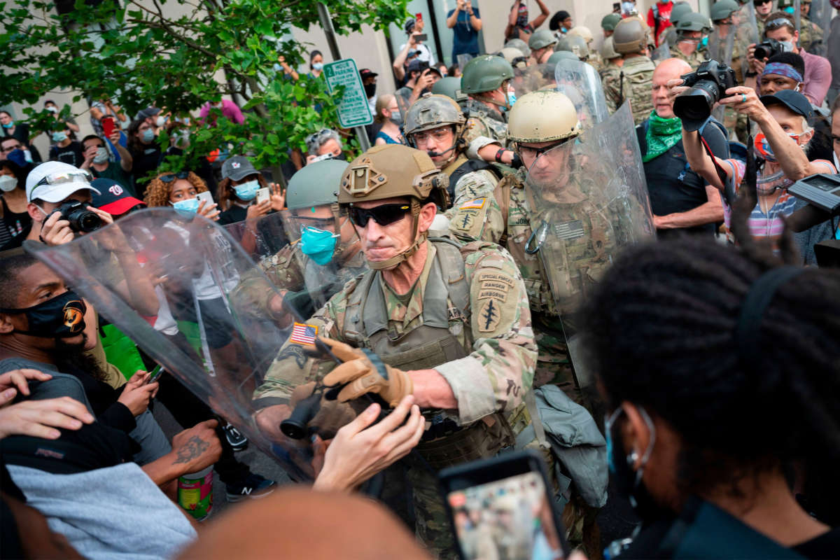 Members of the U.S. Army confront protesters near the White House on June 3, 2020, in Washington, D.C.
