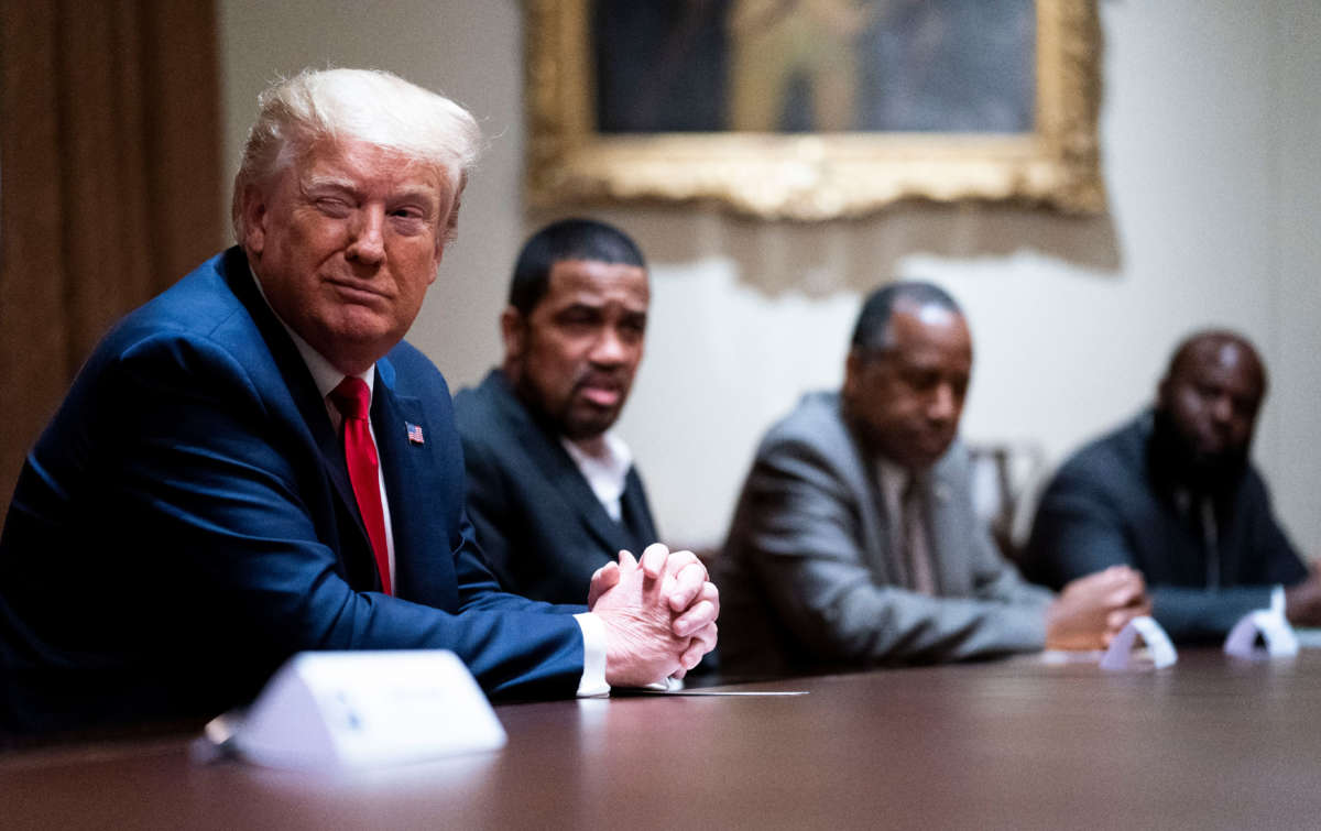 President Trump winks during a round table discussion in the Cabinet Room of the White House on June 10, 2020, in Washington, D.C.
