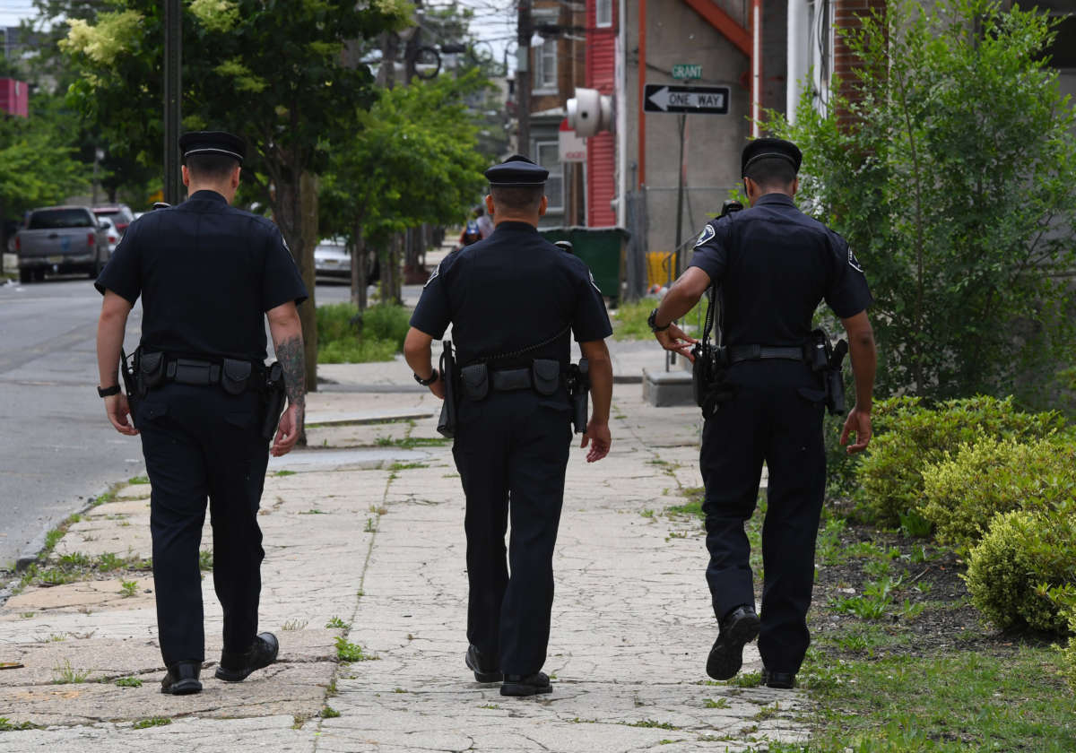 Camden County police officers patrol in Camden, New Jersey, on May 24, 2017.