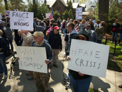 people display signs opposing shelter in place ordinances