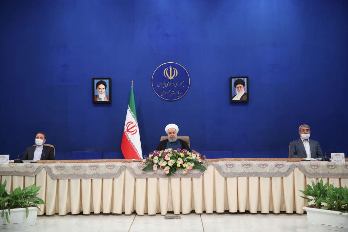 Iranian President Hassan Rouhani (center) attends a program held within to encourage and increase domestic production, in Tehran, Iran, on June 23, 2020.