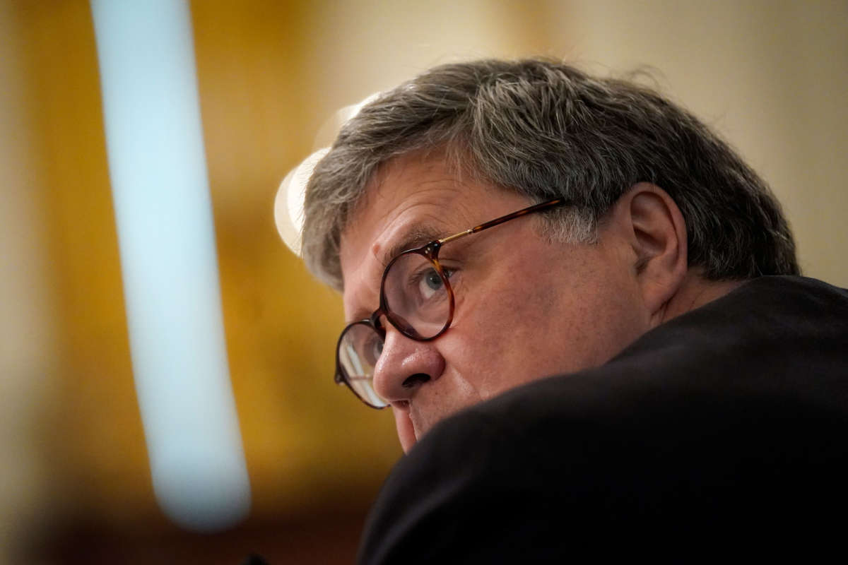 Attorney General William Barr listens during an event about citizens positively impacted by law enforcement, in the East Room of the White House on July 13, 2020, in Washington, D.C.
