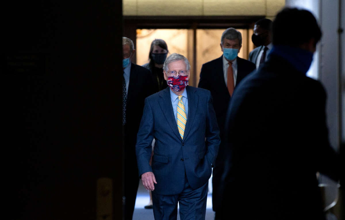 Senate Majority Leader Mitch McConnell departs the weekly Senate Republican policy luncheon in the Hart Senate Office Building on June 30, 2020, in Washington, D.C.