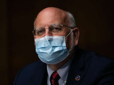 Centers for Disease Control and Prevention Director Robert R. Redfield looks on while testifying at a Senate subcommittee hearing on Capitol Hill on July 2, 2020, in Washington, D.C.