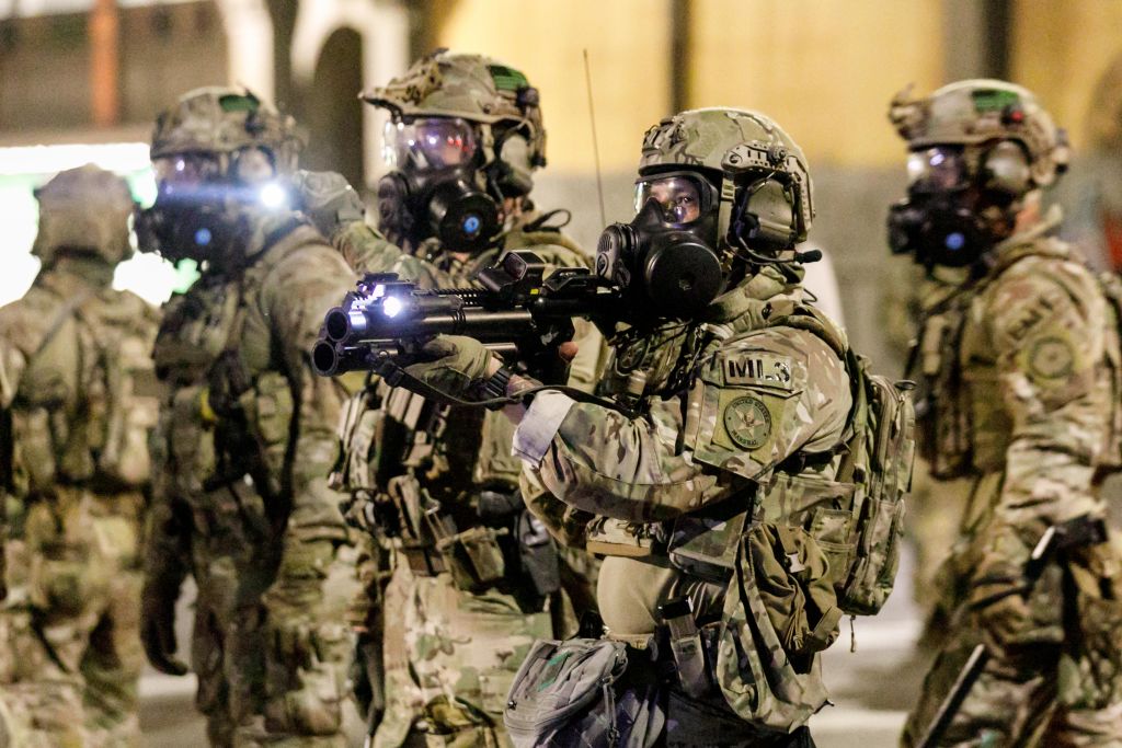 Federal police under the orders of President Trump launch tear gas after a demonstration in Portland, Oregon, on July 23, 2020.