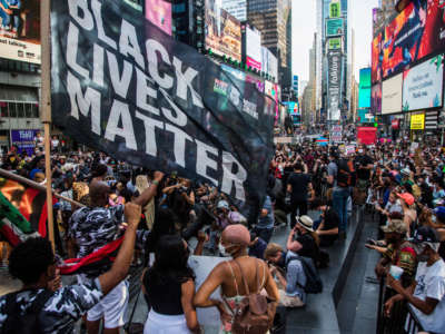 Hundreds of protesters gather in Times Square in New York City on July 26, 2020.