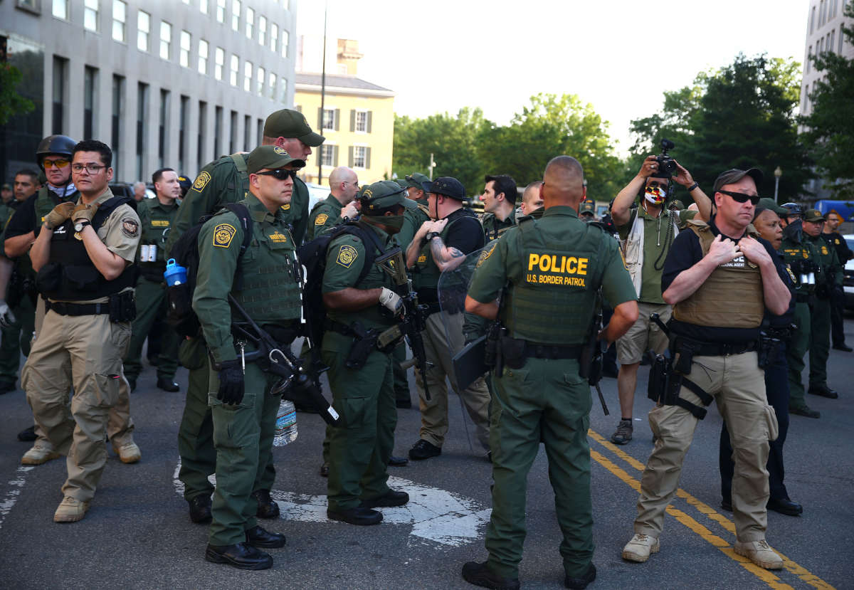 Armed members of the U.S. Border Patrol gather as protests continue citywide against police brutality and the death of George Floyd, on June 3, 2020, in Washington, D.C.