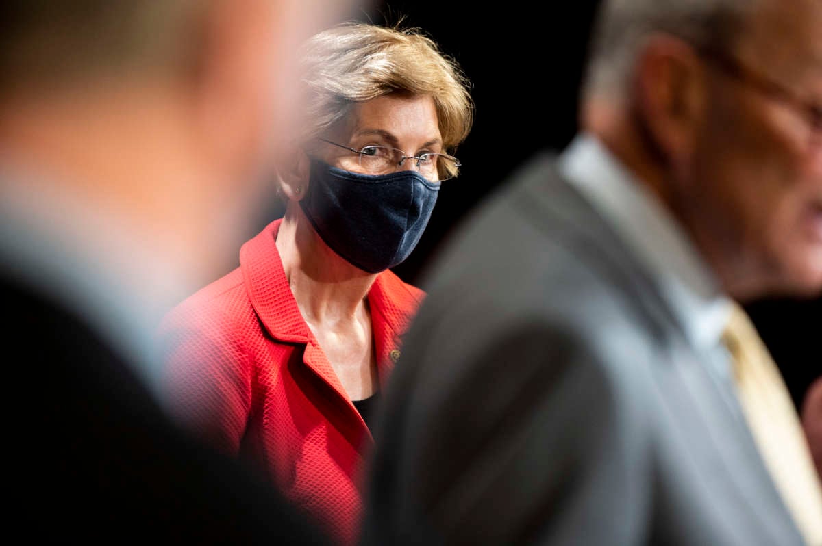 Sen. Elizabeth Warren participates in a news conference in the Capitol to call for an extension of eviction protections in the next coronavirus bill on Wednesday, July 22, 2020.