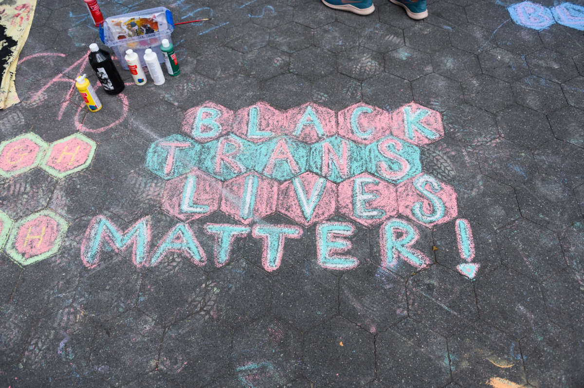 Black Trans Lives Matters chalk art is seen in Washington Square Park on June 26, 2020, in New York City.