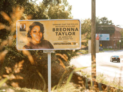 A billboard featuring a picture of Breonna Taylor and calling for the arrest of police officers involved in her death is seen on August 11, 2020, in Louisville, Kentucky.