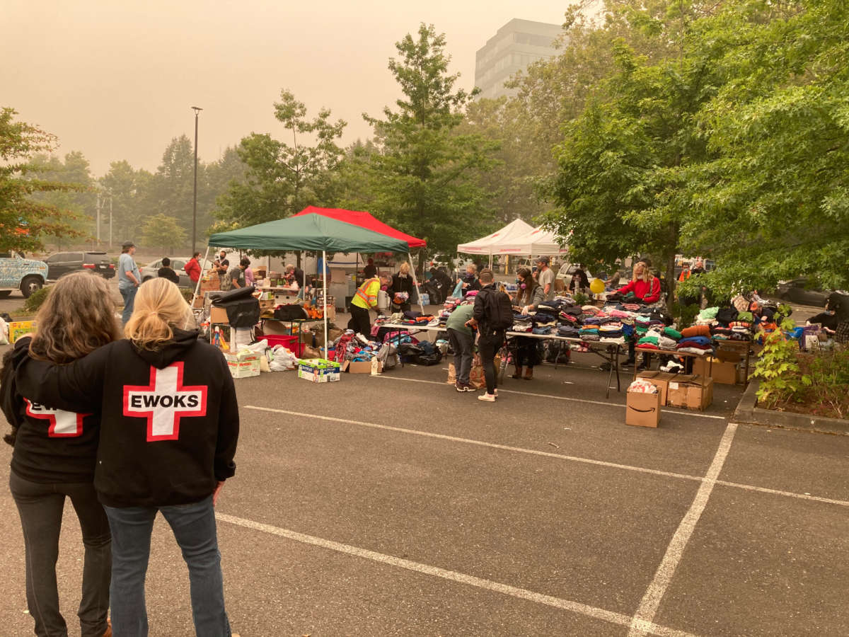 Lisa Lake (right) and another EWOKS volunteer at the mutual aid distribution center in east Portland.