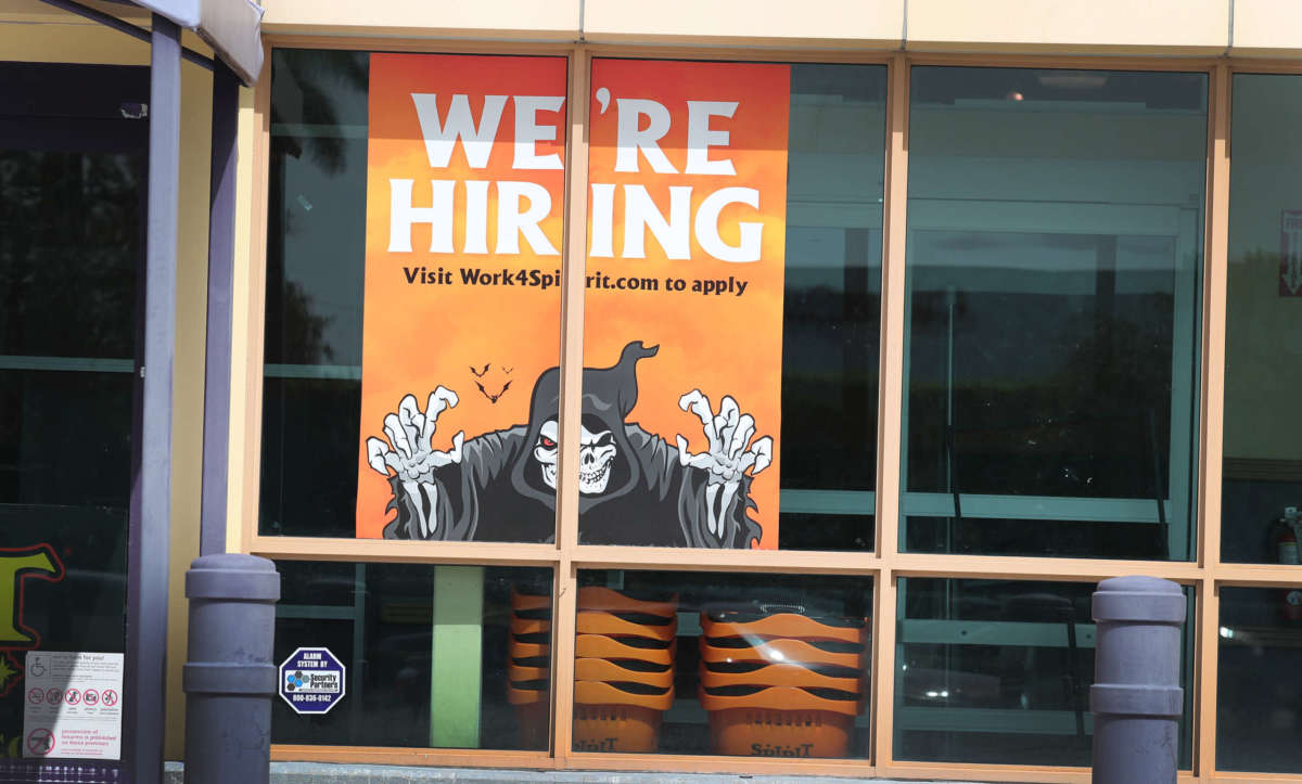 A "We're Hiring" sign is seen in a store front window on September 4, 2020, in Miami, Florida.