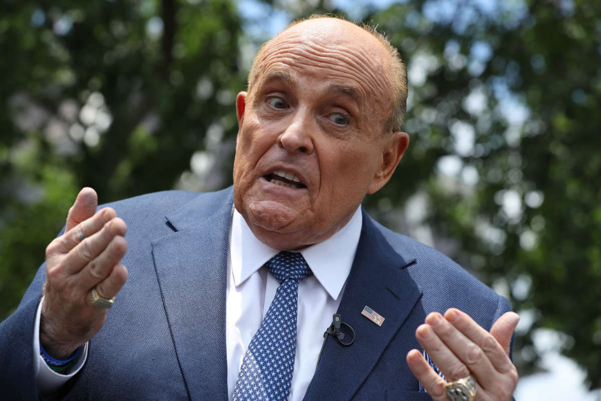 President Trump's lawyer Rudy Giuliani talks to journalists outside the White House West Wing, July 1, 2020, in Washington, D.C.