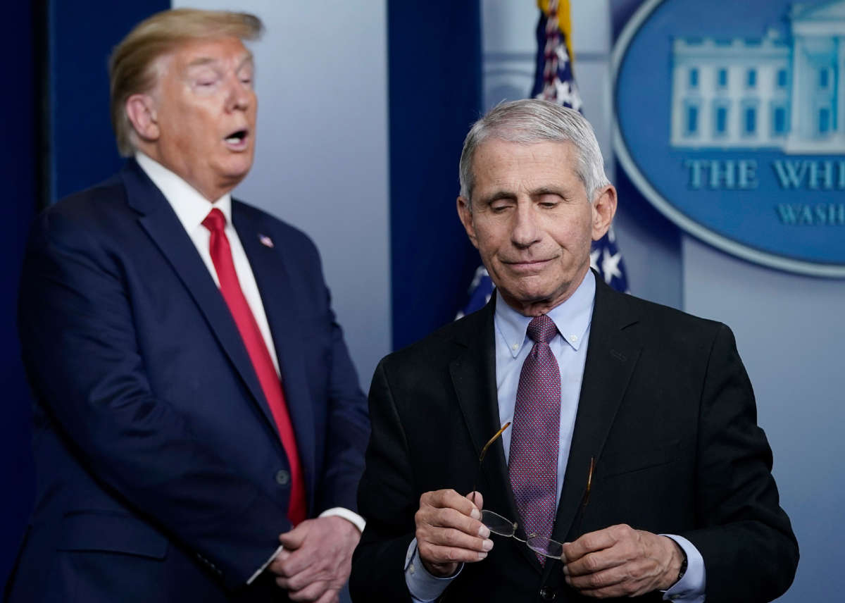 Dr. Anthony Fauci, director of the National Institute of Allergy and Infectious Diseases, and President Trump participate in the daily coronavirus task force briefing at the White House on April 22, 2020, in Washington, D.C.
