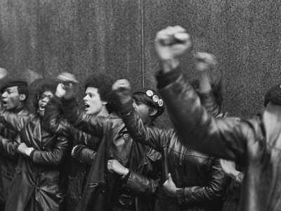 Black Panther Party members demonstrate, fists raised outside the New York City courthouse, New York, New York, on April 11, 1969.