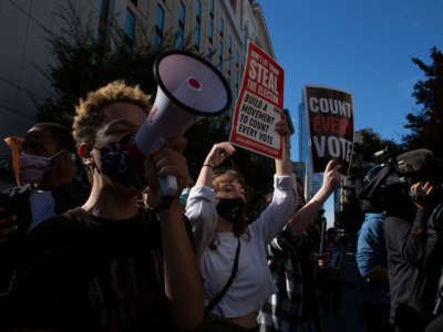 Demonstrators protest outside the Pennsylvania Convention Center on November 5, 2020, in Philadelphia.