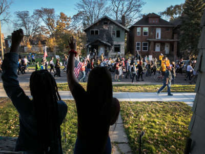 Demonstrators calling for President Trump to concede the presidency march on November 7, 2020, in Detroit, Michigan.