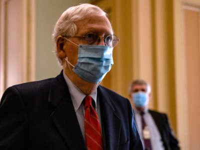 Senate Majority Leader Mitch McConnell heads to the Senate floor to gavel the Senate into session on November 9, 2020, in Washington, D.C.