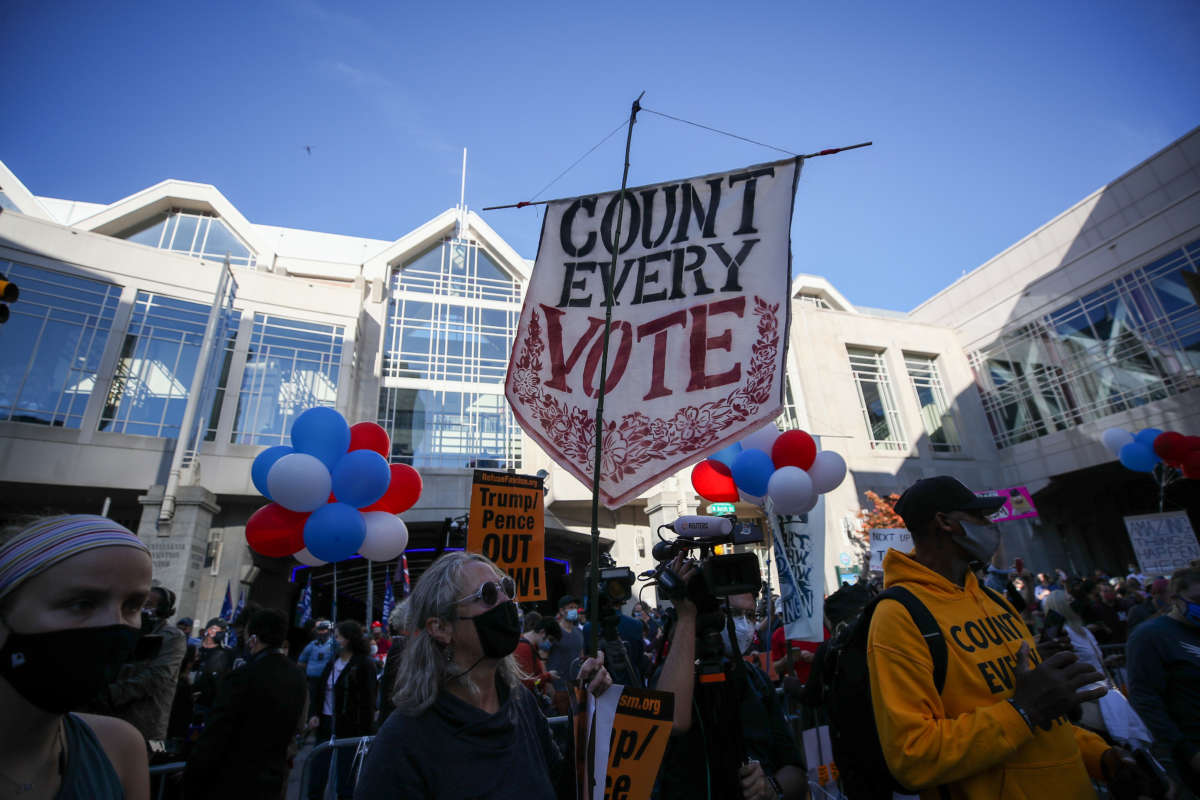 Trump and Biden supporters gather at the ballot counting center in Philadelphia, Pennsylvania, on November 6, 2020.