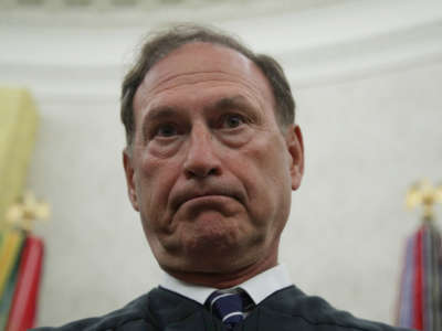 Supreme Court Justice Samuel Alito is seen in the Oval Office of the White House on July 23, 2019, in Washington, D.C.
