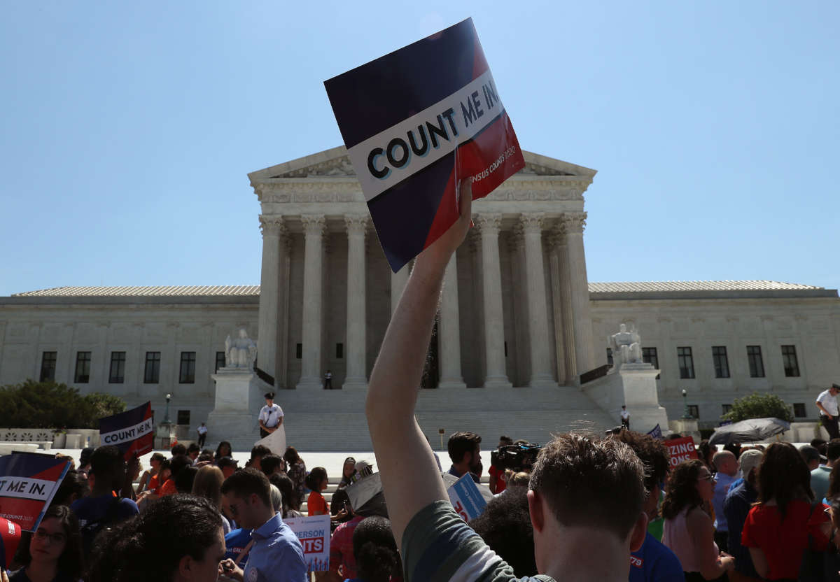 People gather in front of the U.S. Supreme Court in Washington, D.C.