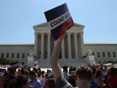 People gather in front of the U.S. Supreme Court in Washington, D.C.