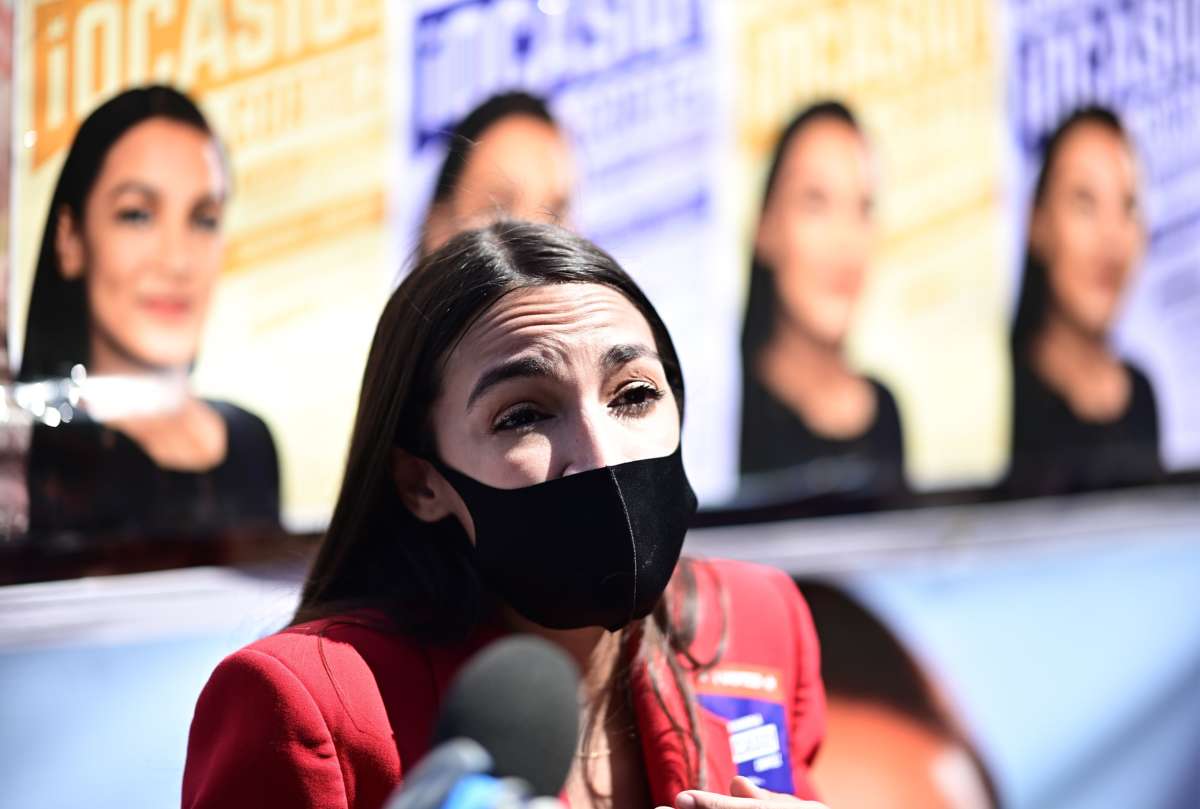 Rep. Alexandria Ocasio-Cortez speaks to the press near a polling station during the New York primaries Election Day on June 23, 2020, in New York City.