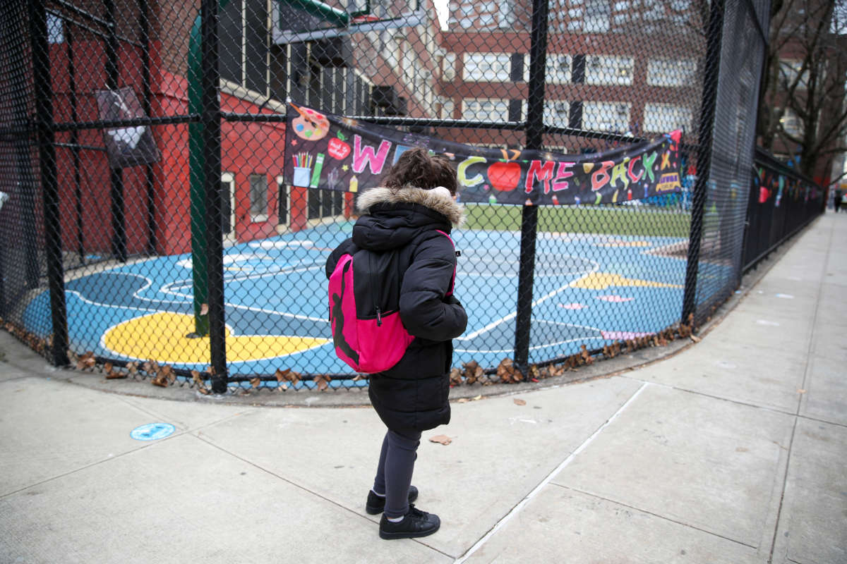 A student is seen as New York City elementary schools are opened after COVID-19 measures on December 7, 2020.