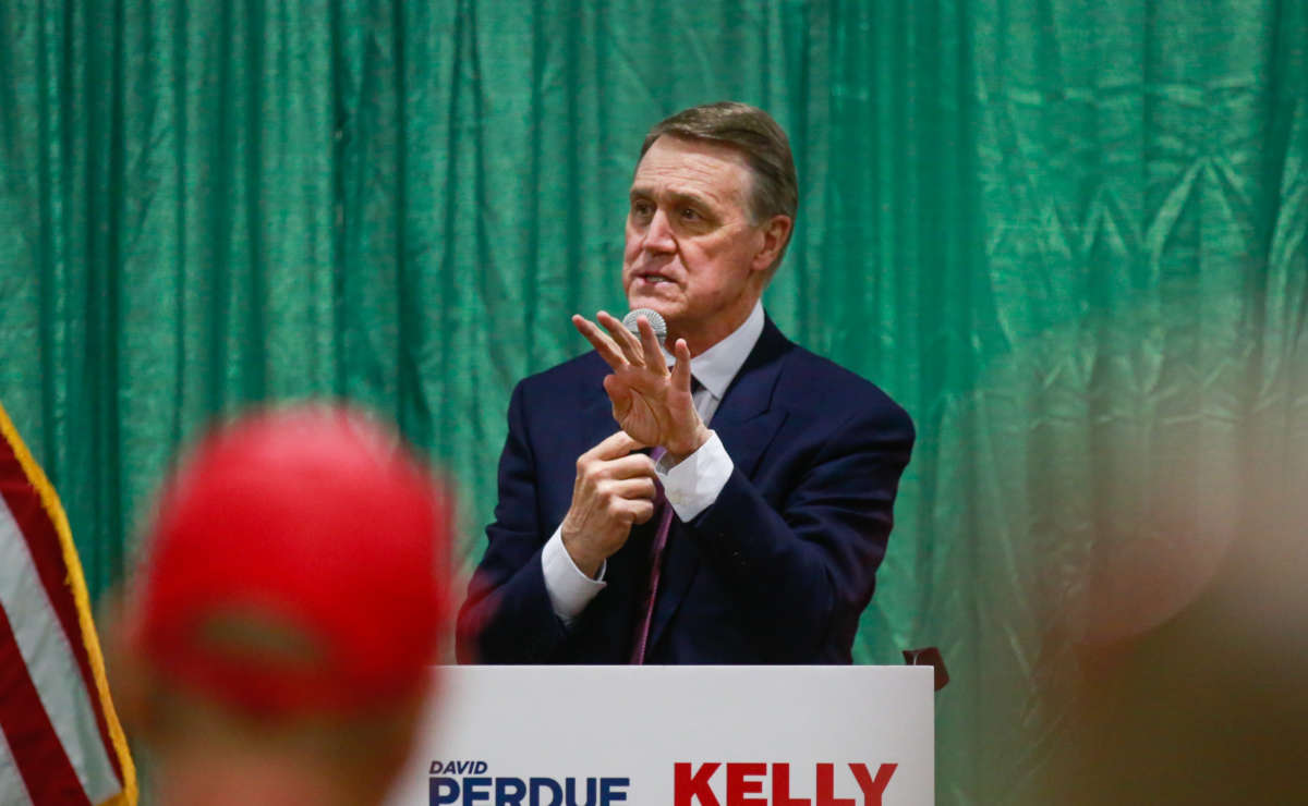 Sen. David Perdue speaks at the Save Our Majority Rally on November 19, 2020 in Perry, Georgia.