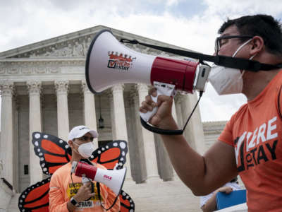 DACA recipients and their supporters rally outside the U.S. Supreme Court on June 18, 2020, in Washington, D.C.