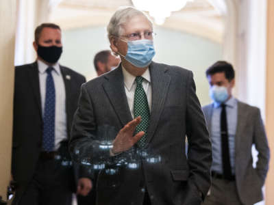 Senate Majority Leader Mitch McConnell leaves the Senate floor in the Capitol on Thursday, December 3, 2020.
