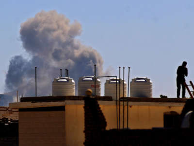 Smoke billows following a reported airstrike by the Saudi-led coalition in the Yemeni capital Sanaa, on November 27, 2020.