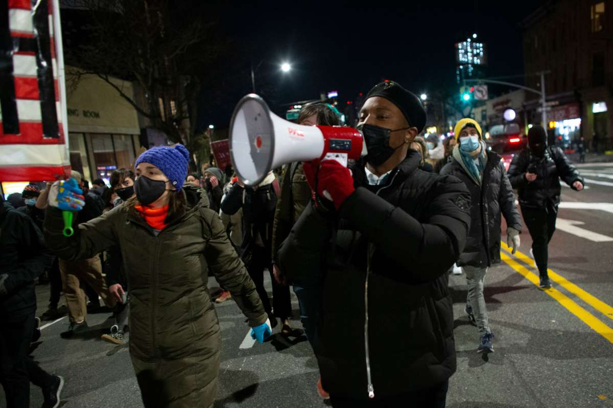 Demonstrators march through Brooklyn, New York during a protest against the current administration on January 7, 2021, a day after pro-Trump mob stormed and trashed the Capitol.