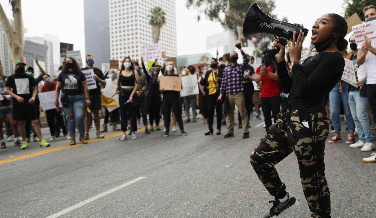 Black Lives Matter-Los Angeles supporters protest outside the Unified School District headquarters calling on the board of education to defund school police on June 23, 2020, in Los Angeles, California.