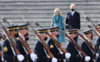 First Lady Jill Biden and President Joe Biden watch as troops march in front of the U.S. Capitol on January 20, 2021, in Washington, D.C.