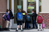 Students wait to enter the school at Freedom Preparatory Academy on February 10, 2021, in Provo, Utah.