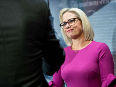 Sen. Kyrsten Sinema attends a news conference in the Capitol on December 4, 2019.