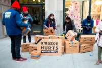 Amazon workers and community allies demonstrate during a protest in front of CEO Jeff Bezos's Manhattan residence on December 2, 2020.