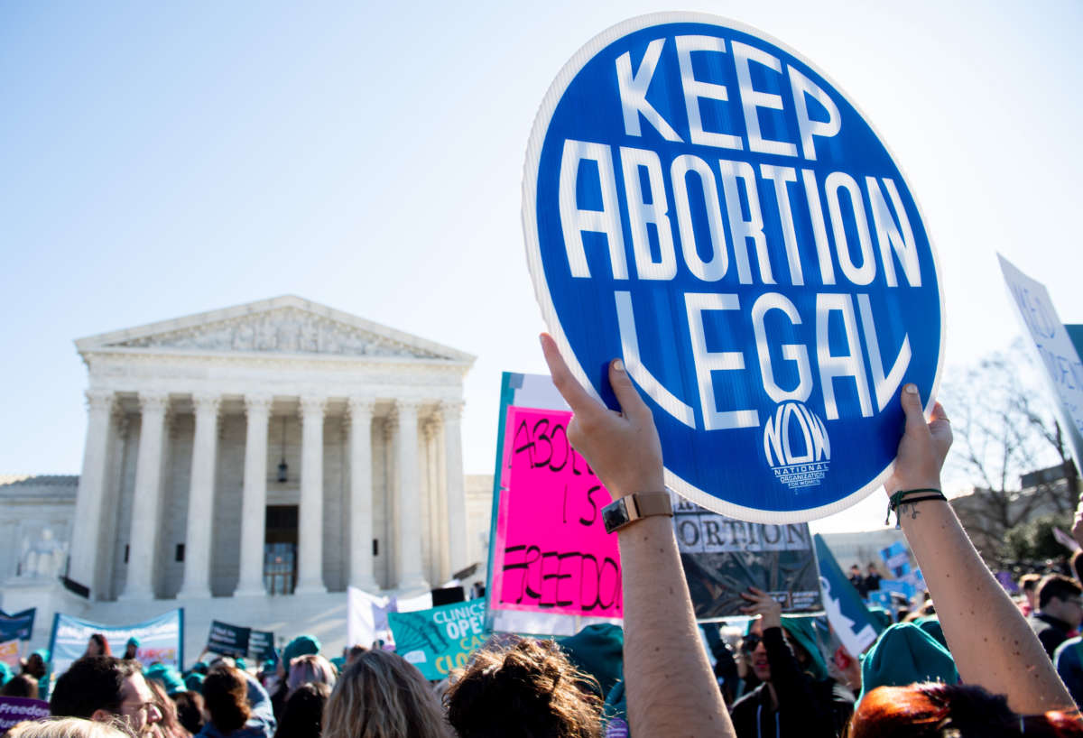 Pro-choice activists supporting legal access to abortion protest during a demonstration outside the Supreme Court in Washington, D.C., on March 4, 2020.