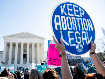 Pro-choice activists supporting legal access to abortion protest during a demonstration outside the Supreme Court in Washington, D.C., on March 4, 2020.