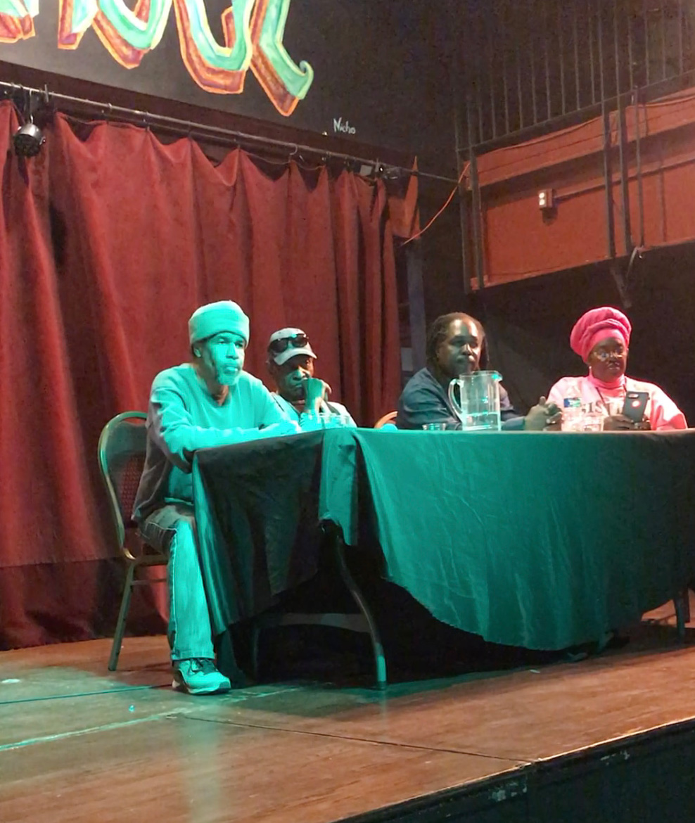 Albert Woodfox (left) speaks shortly after the fourth anniversary of his release from Louisiana State Penitentiary in Angola at a meeting of Justice and Beyond at the Cafe Istanbul in New Orleans on March 9, 2020.