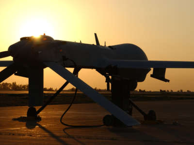 A Predator drone prepares for a nighttime surveillance mission on February 11, 2004, at Balad Air Base in Iraq.