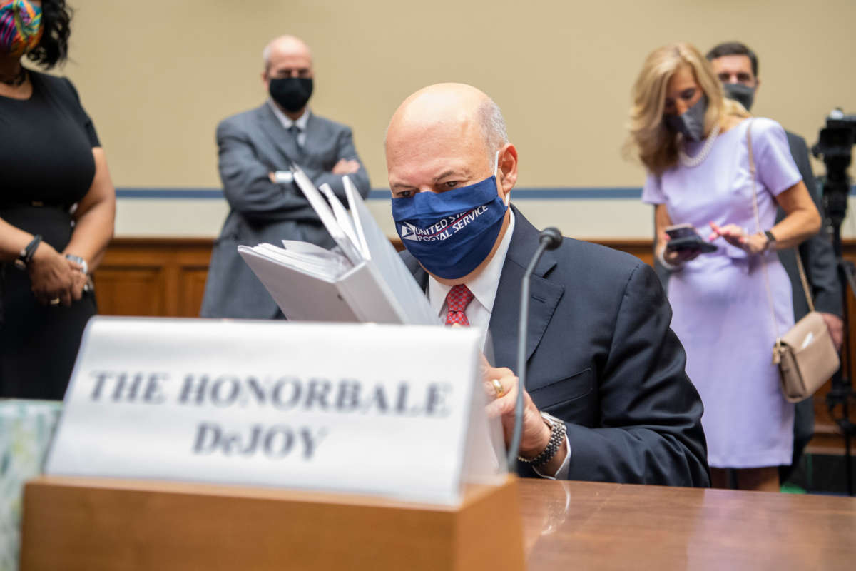Postmaster General Louis DeJoy arrives to testify during a hearing before the House Oversight and Reform Committee on August 24, 2020, on Capitol Hill in Washington, D.C.